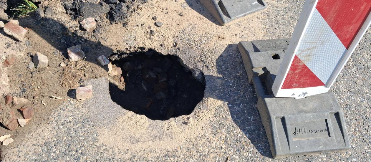 Afbeelding bij Holle ruimte onder wegdek St. Odastraat in Melderslo